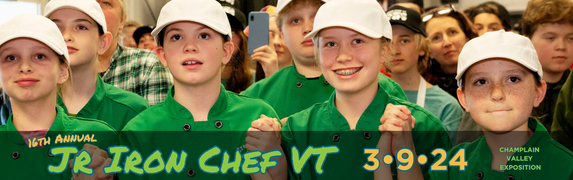Jr Iron Chef VT - 3/9/24 - Champlain Valley Exposition. Image of young girls holding hands with looks of excitement.
